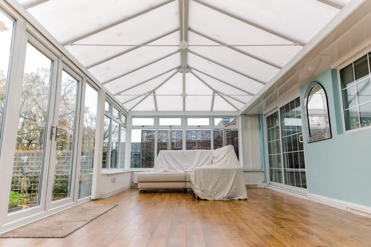 Before: A dull and uninspiring conservatory in need of a makeover. Limited use due to temperature fluctuations and an outdated appearance.