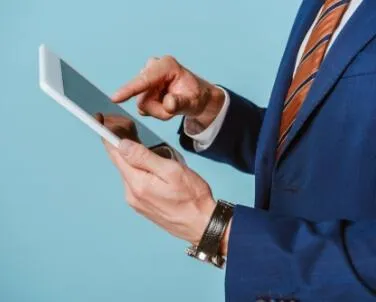 Young professional working remotely on a laptop — virtual assistant productivity