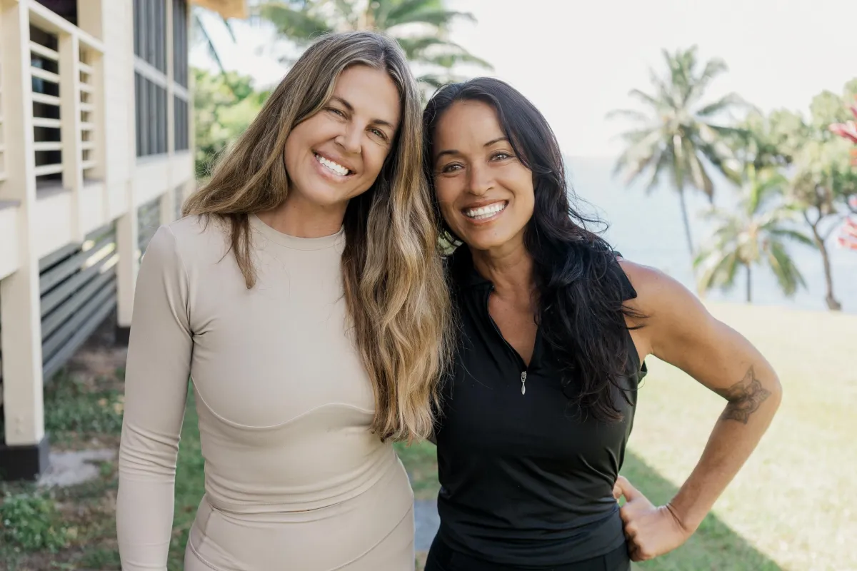 a rocky beach with a sunset