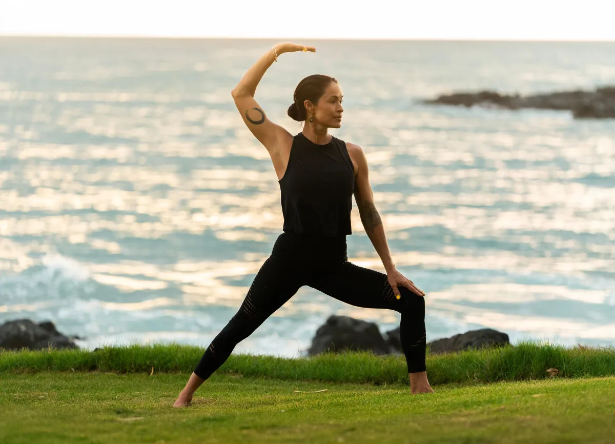 gray and black stone near body of water during daytime