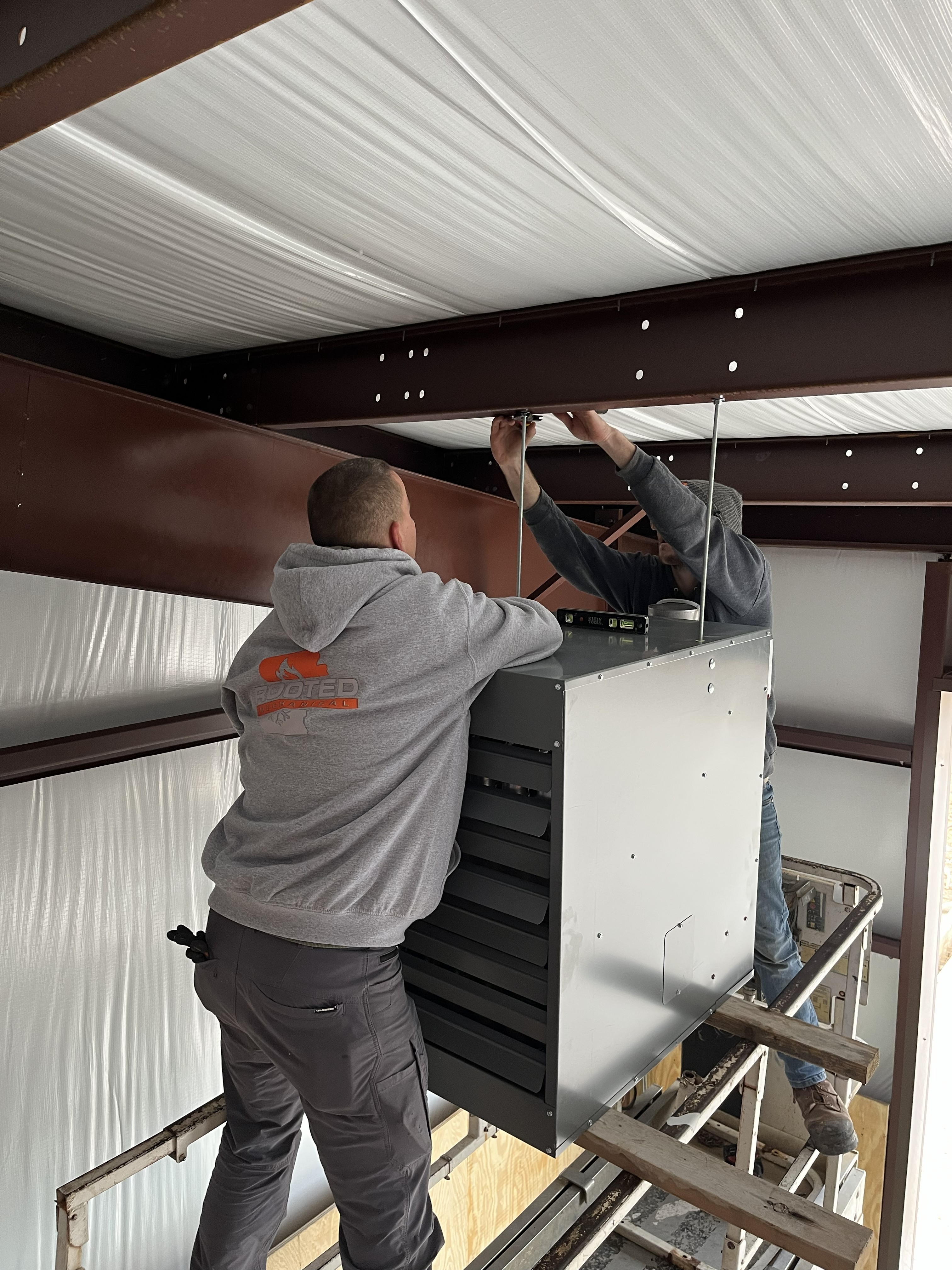 HVAC ductwork installation for new air conditioning system in Northwest Arkansas home