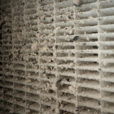 dust buildup in air vent causing poor indoor air quality in Northwest Arkansas home