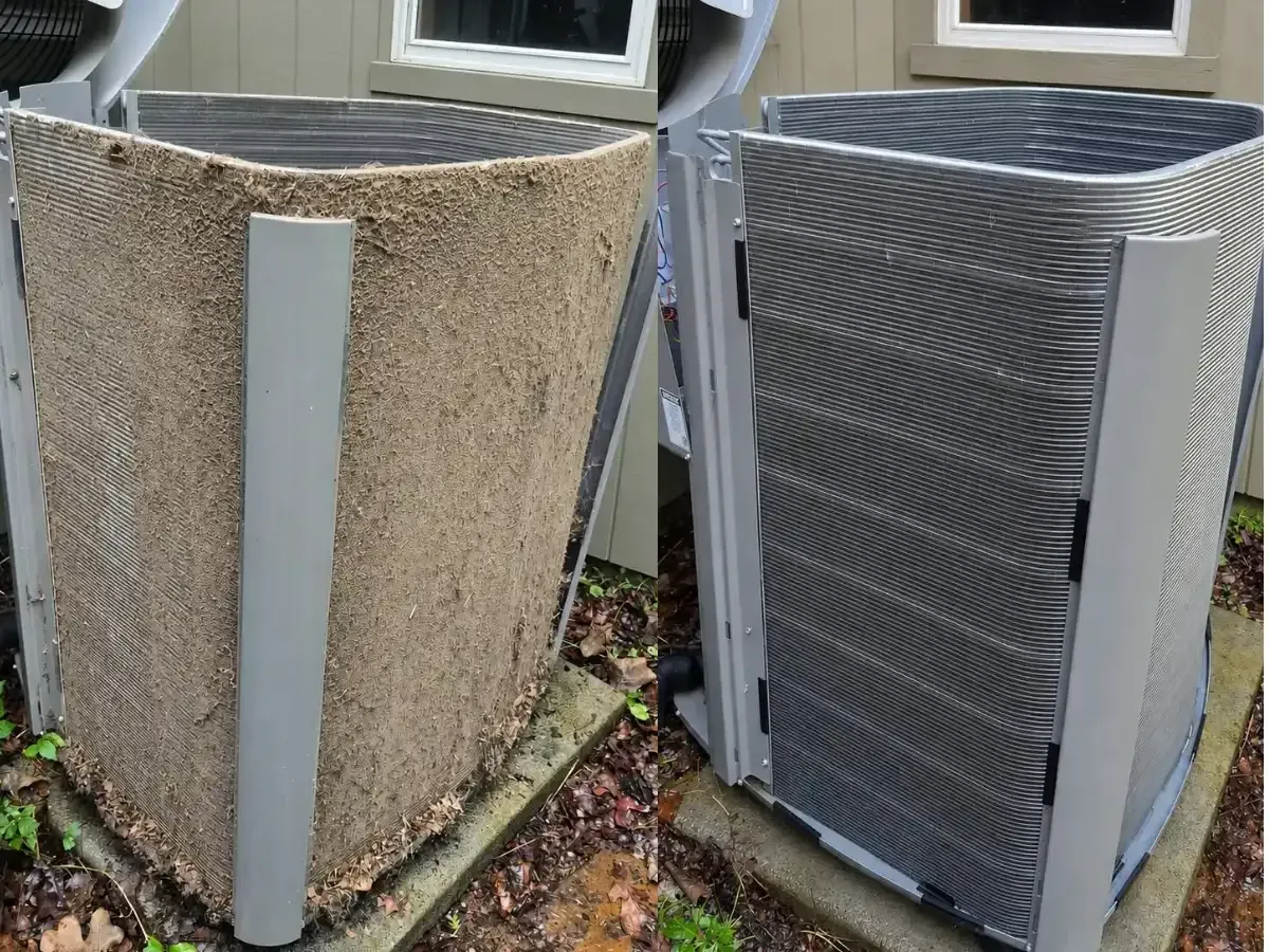 HVAC technician checking a system before summer heat in Northwest Arkansas