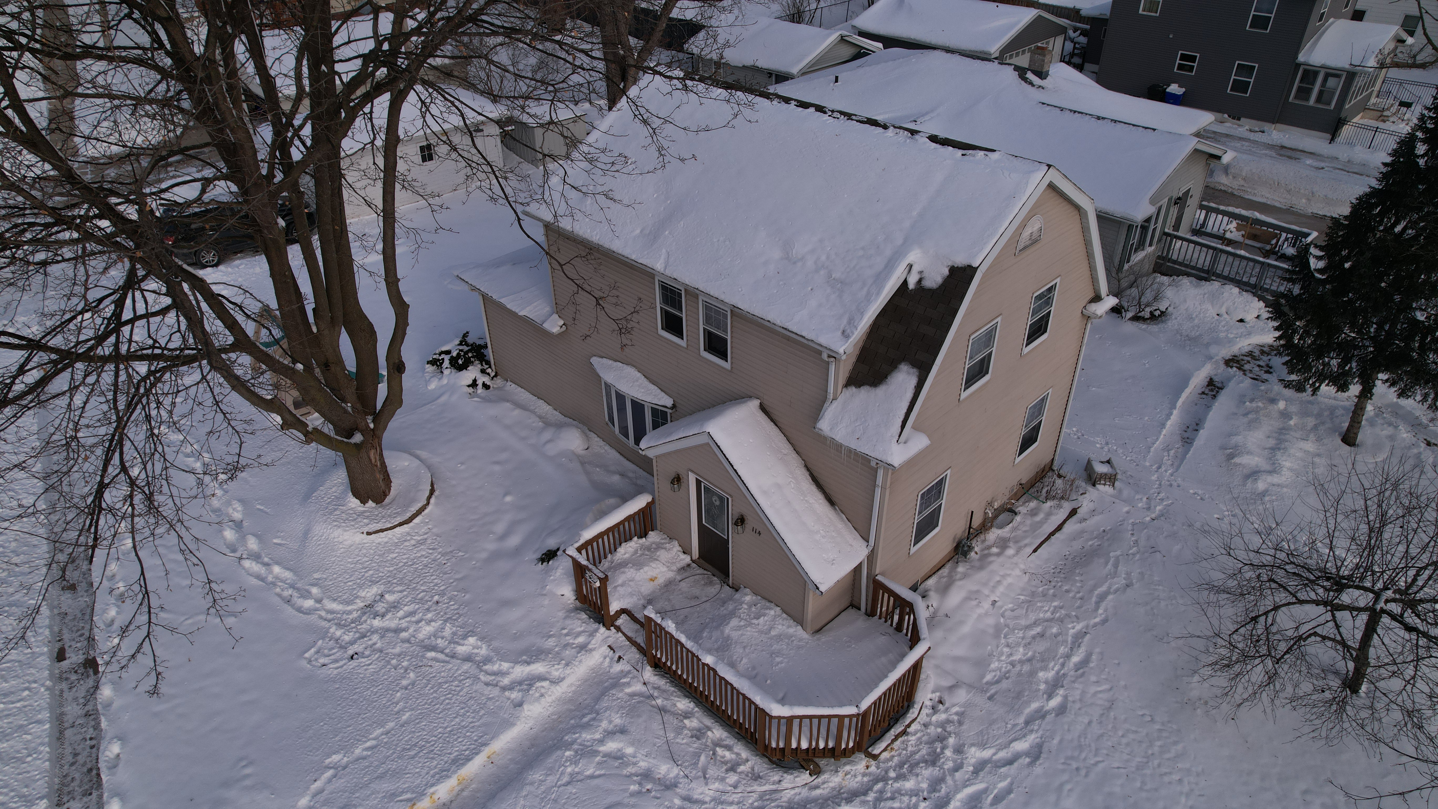 drone photo of suburban Kaukauna home in winter