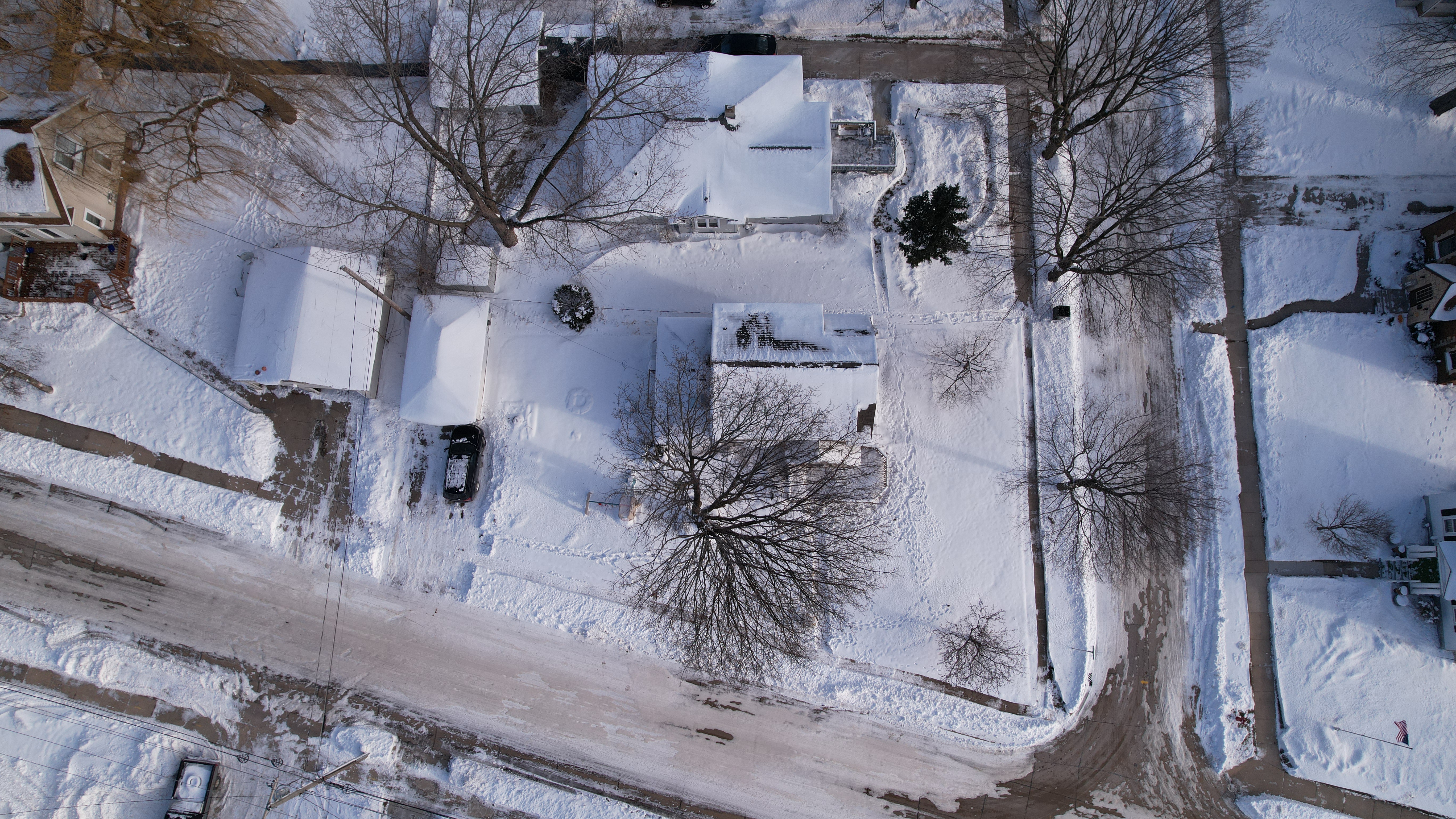 drone photo of suburban Kaukauna home in winter