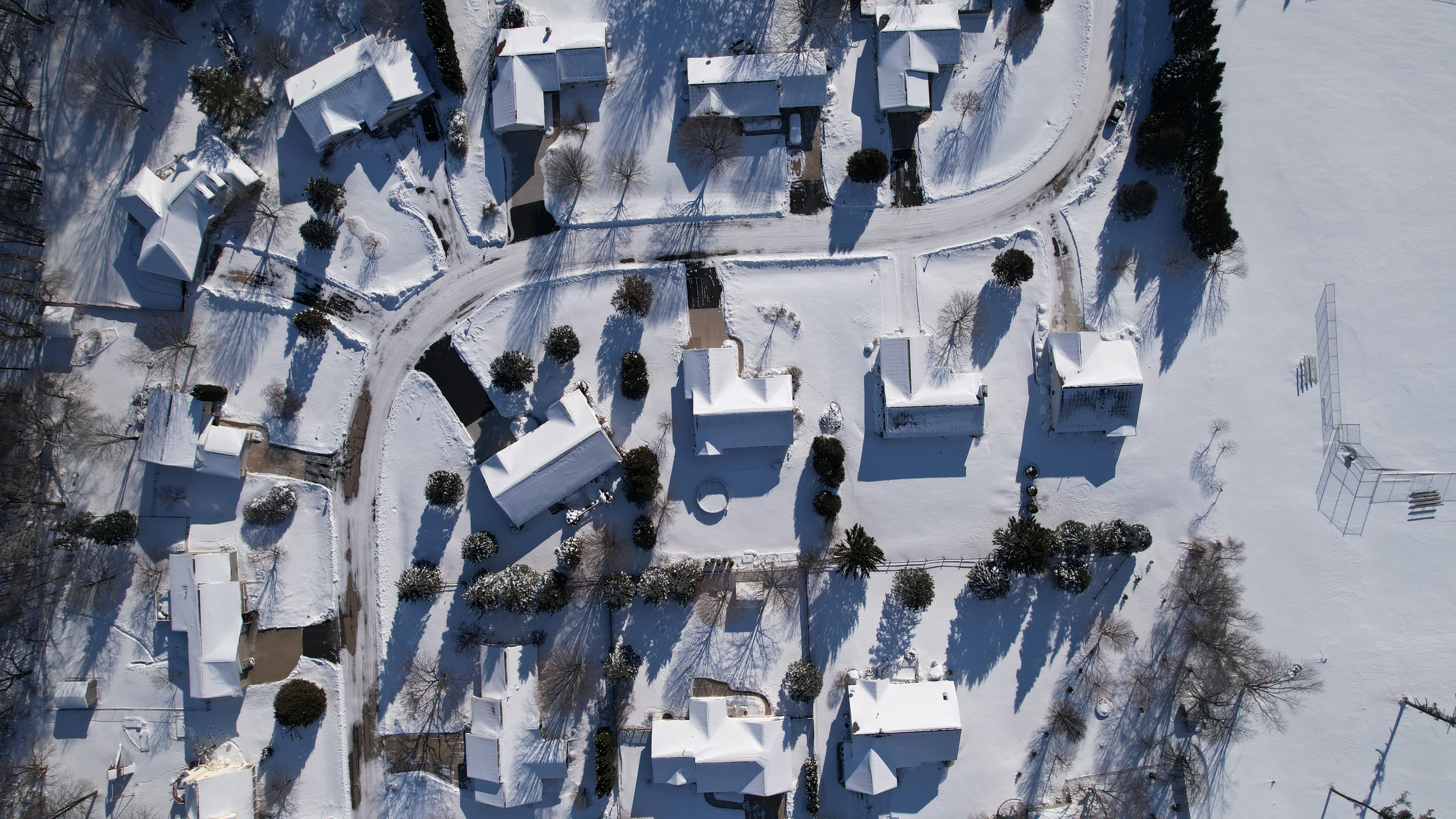 drone photo of suburban Appleton home in winter