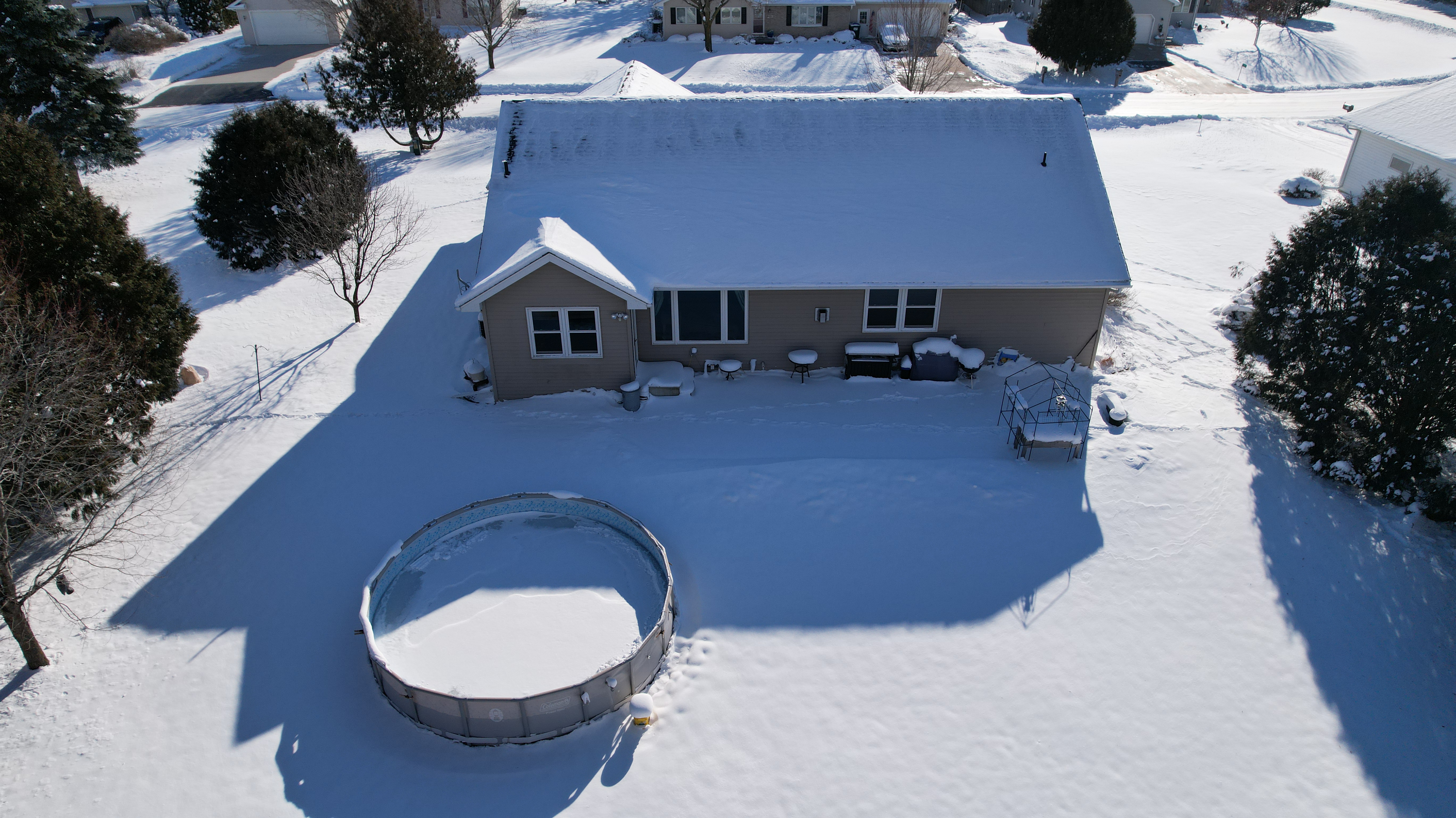 drone photo of suburban Appleton home in winter