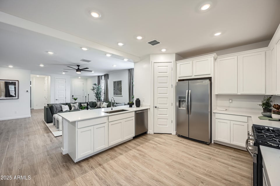 kitchen with white cabinets
