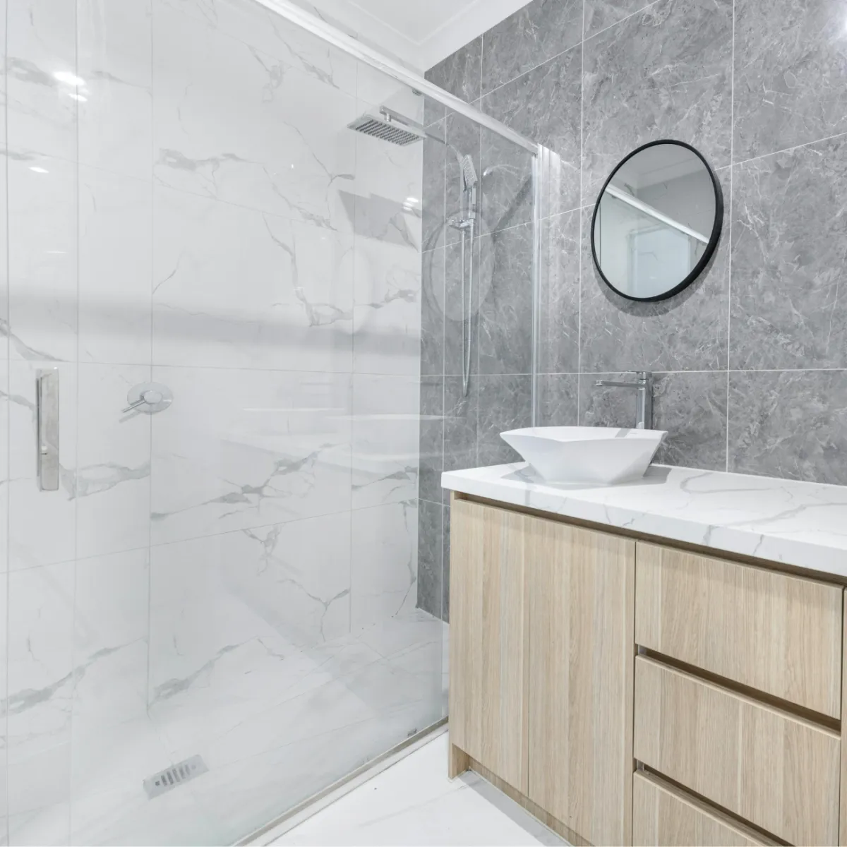 Bathroom remodeling in Omaha with walk in glass shower and modern vanity