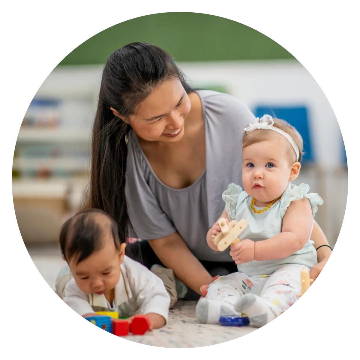 chilcare staff with babies