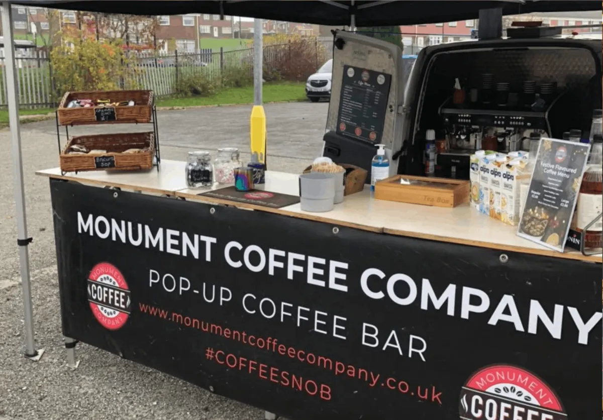 Coffee trailer setup at a metro station in 2015