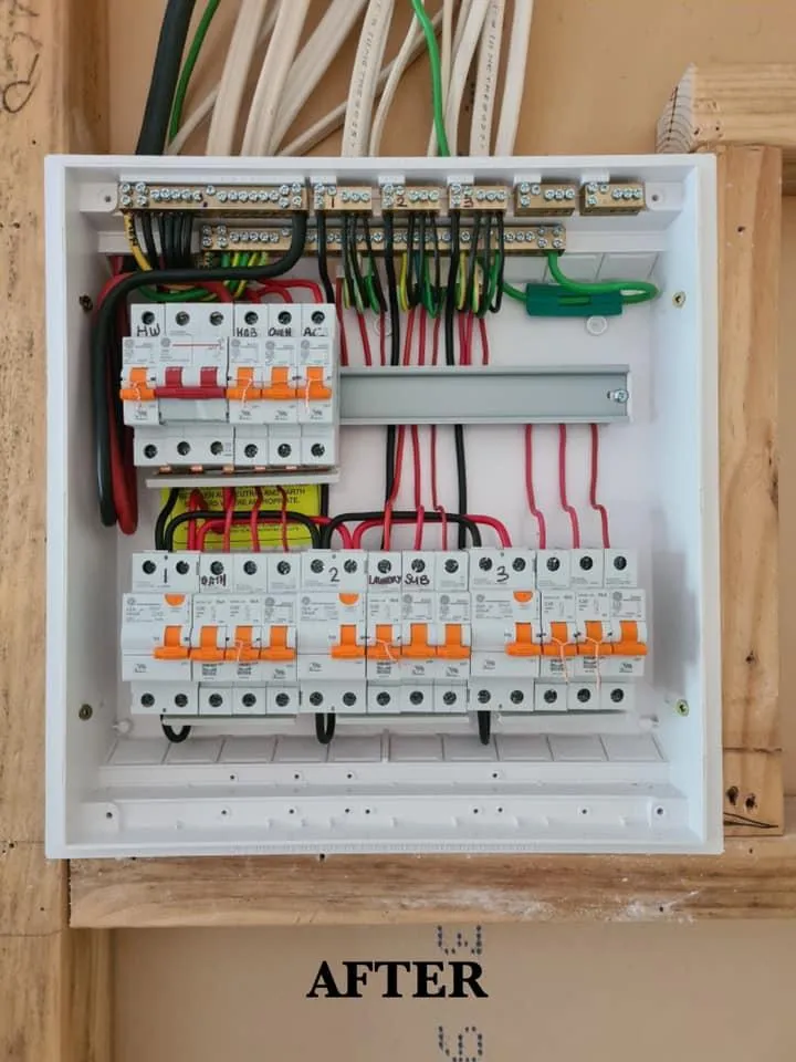 Updated electrical switchboard with neatly installed circuit breakers and organized wiring by Zed Electrical Ltd