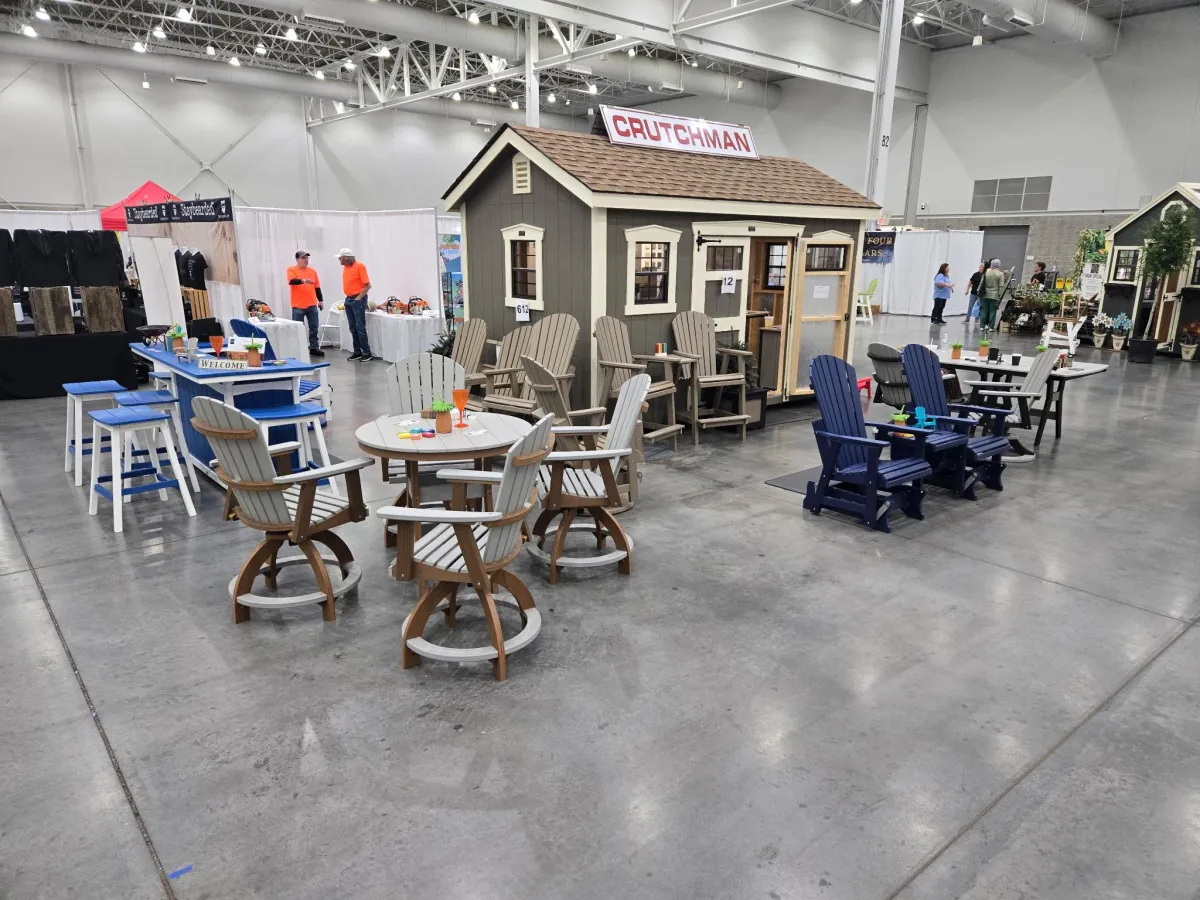 RidgeCraft Boltline cap installed on a rugged pickup parked at sunset on a gravel boat launch. Warm dusk sky, subtle sea spray in background, photorealistic composition emphasizing fit, clamp detail, and textured finish — lifestyle context for product use.