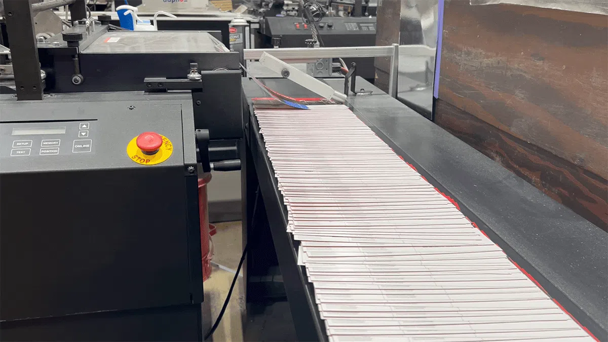 Mail pieces carried down a print line
