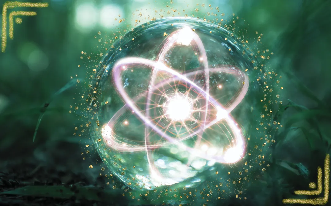 a person holding a glass ball in their hand