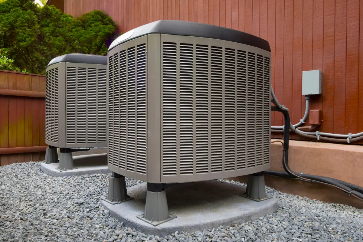 Two HVAC furnaces side by side