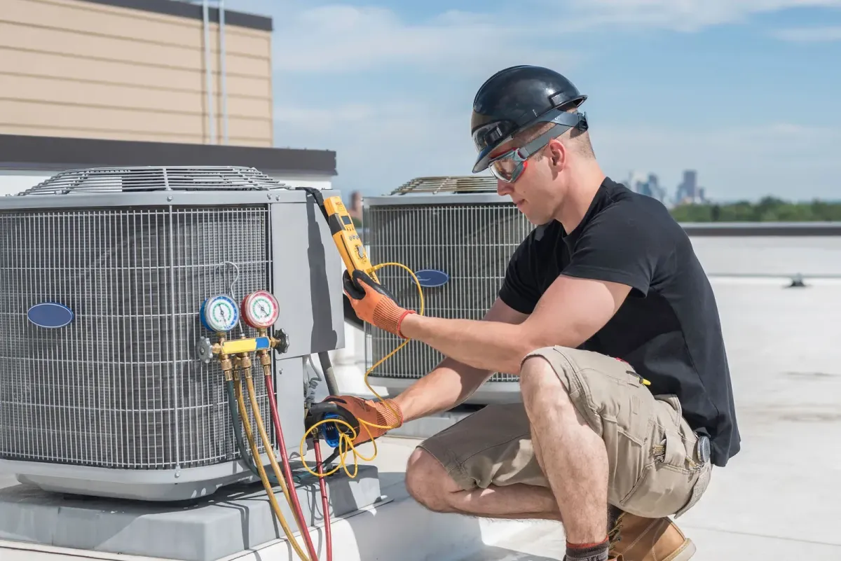 HVAC Technician Repairing AC Unit