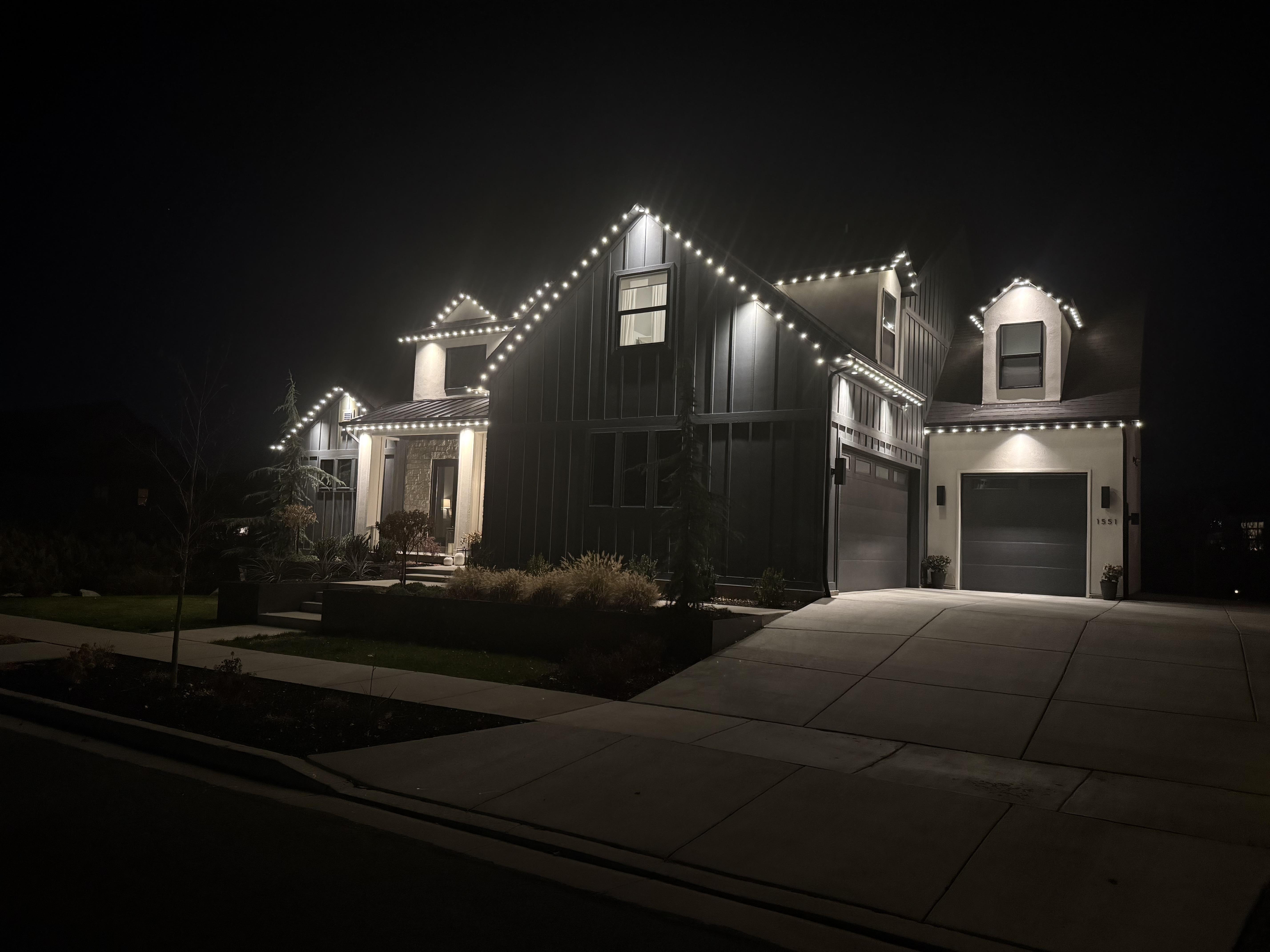 Residential Christmas light installation in South Utah County by Max Mowing