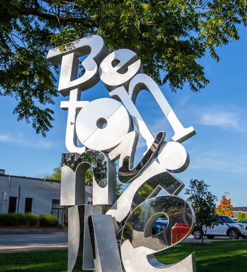 Bentonville Arkansas downtown sign neChums Junk Removal service area