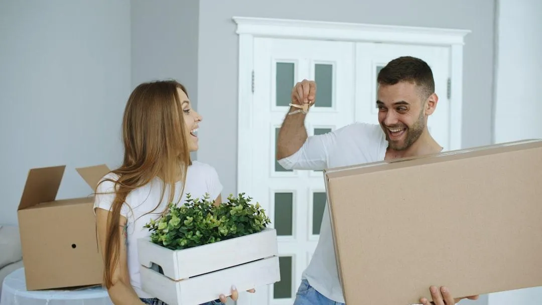 first time home buyer receiving house keys