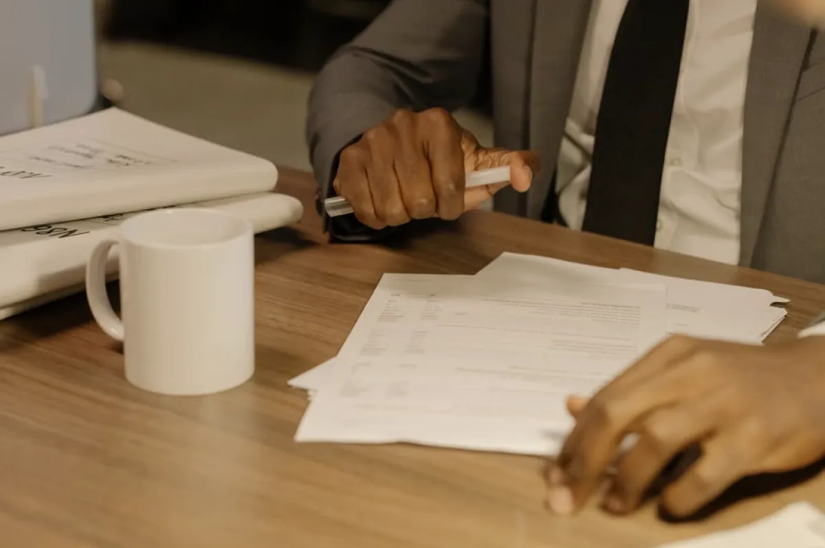 Homeowner reviewing mortgage closing paperwork