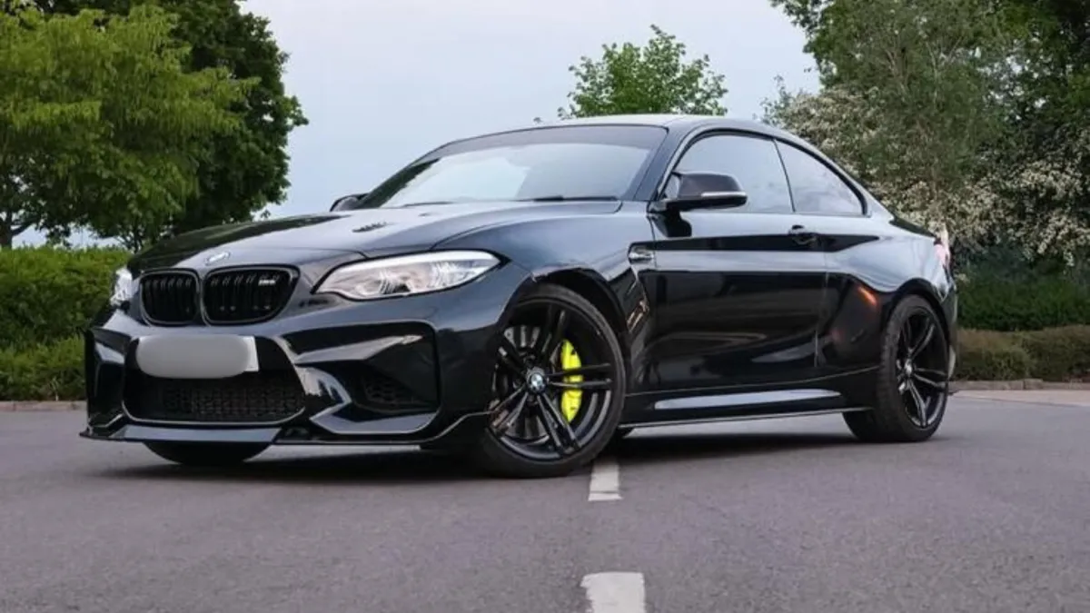 Black BMW wrap on 2-door - Swindon