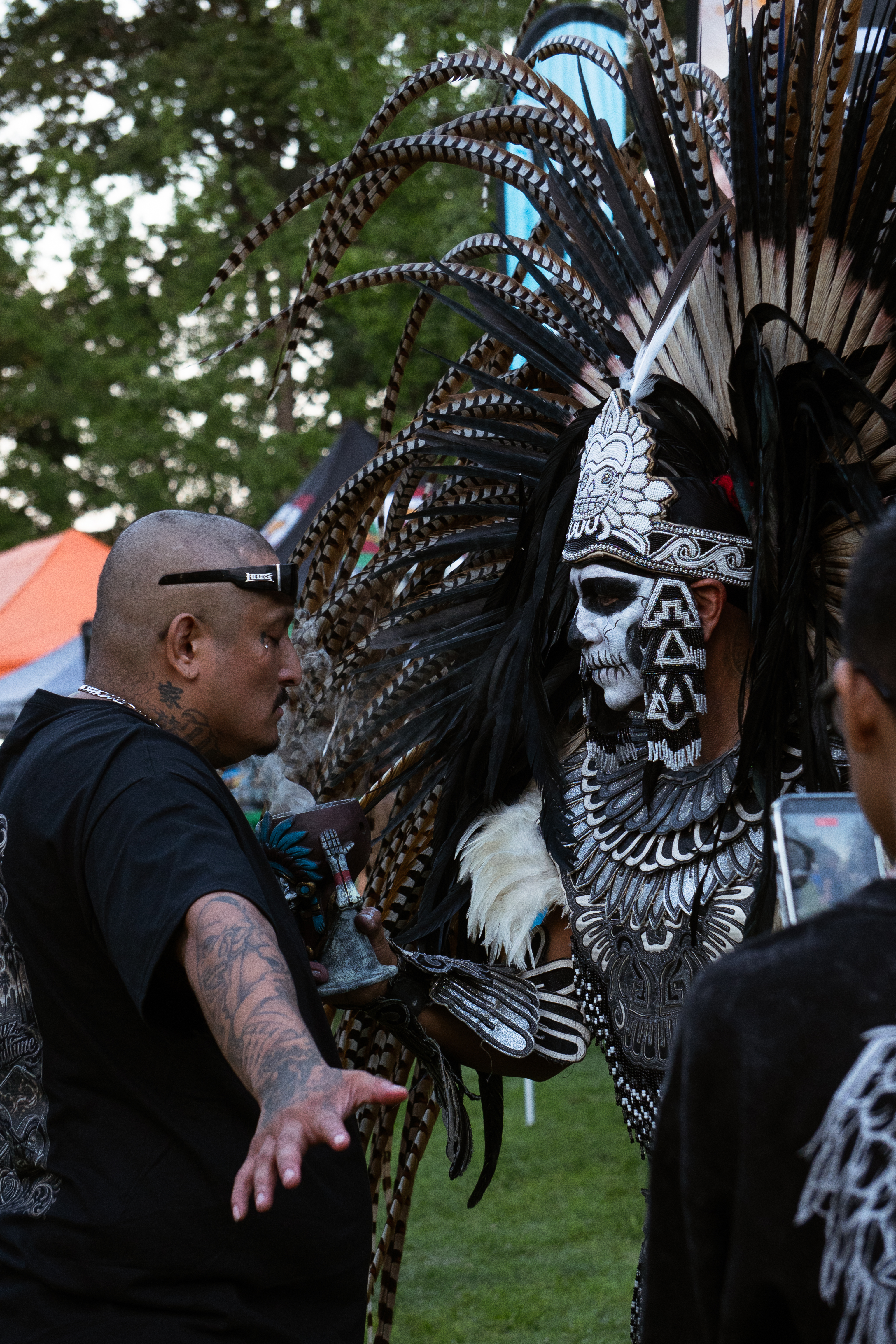 A vibrant community gathering under a bright, expansive horizon, symbolising cultural growth and unity in Idaho.