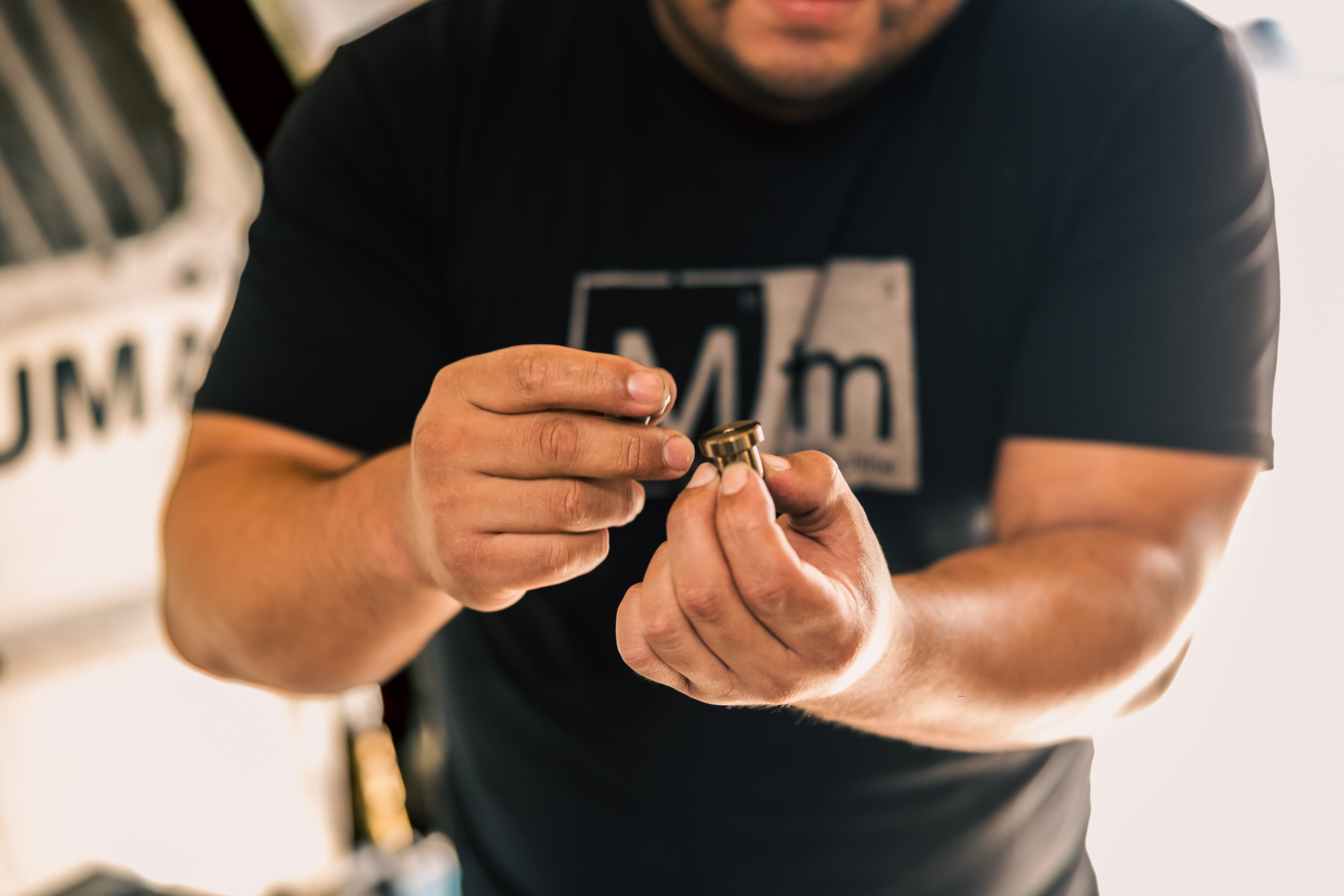 Miguel is verifying coolant flow while the Fadal 4020 machine is milling hardened steel in a workshop.