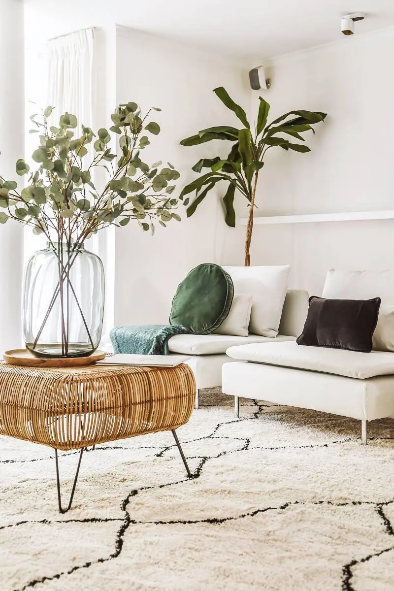 A large room with a checkered floor and mirrors