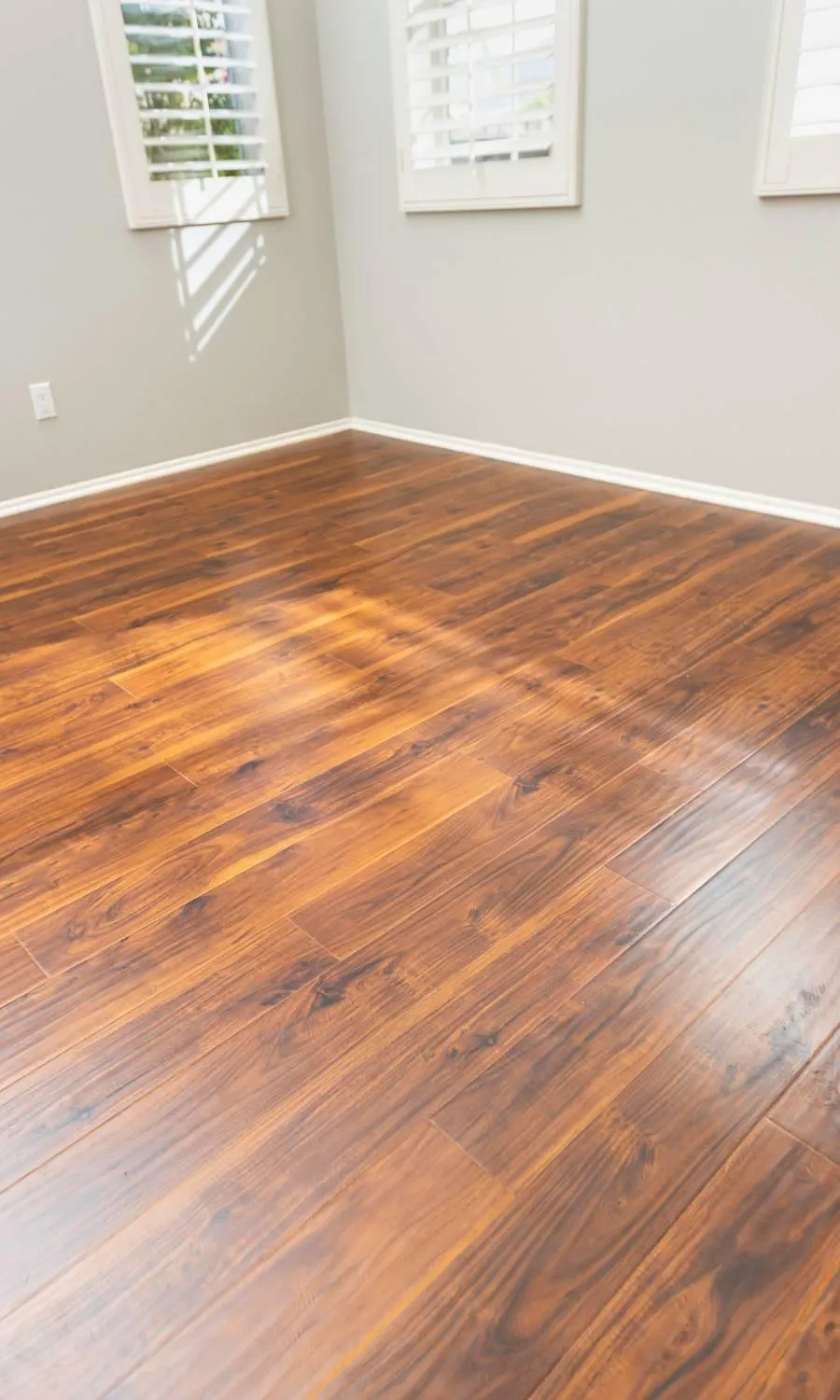 A large room with a checkered floor and mirrors