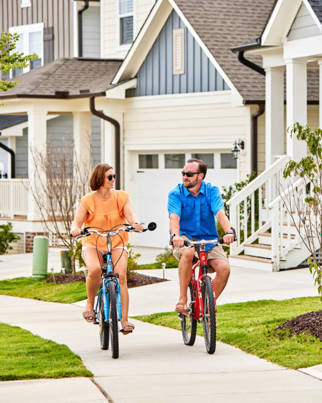 couple on bike chatham park