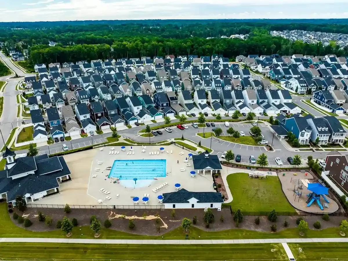 Aerial drone view of established Apex NC neighborhood showing Charleston style homes