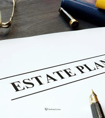 Image of a paper labeled "Estate Planning" with a pen on top, symbolizing legacy planning and documentation services.