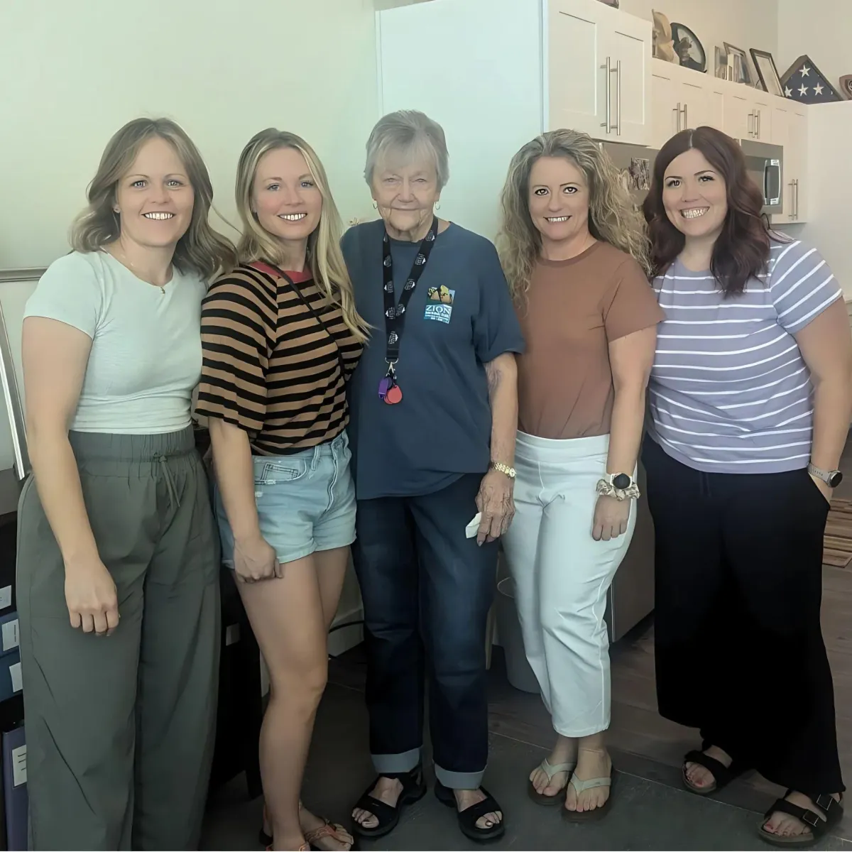 Image of Jaime with her grandma and family, showcasing how their advocacy for older adults is rooted in personal experience.