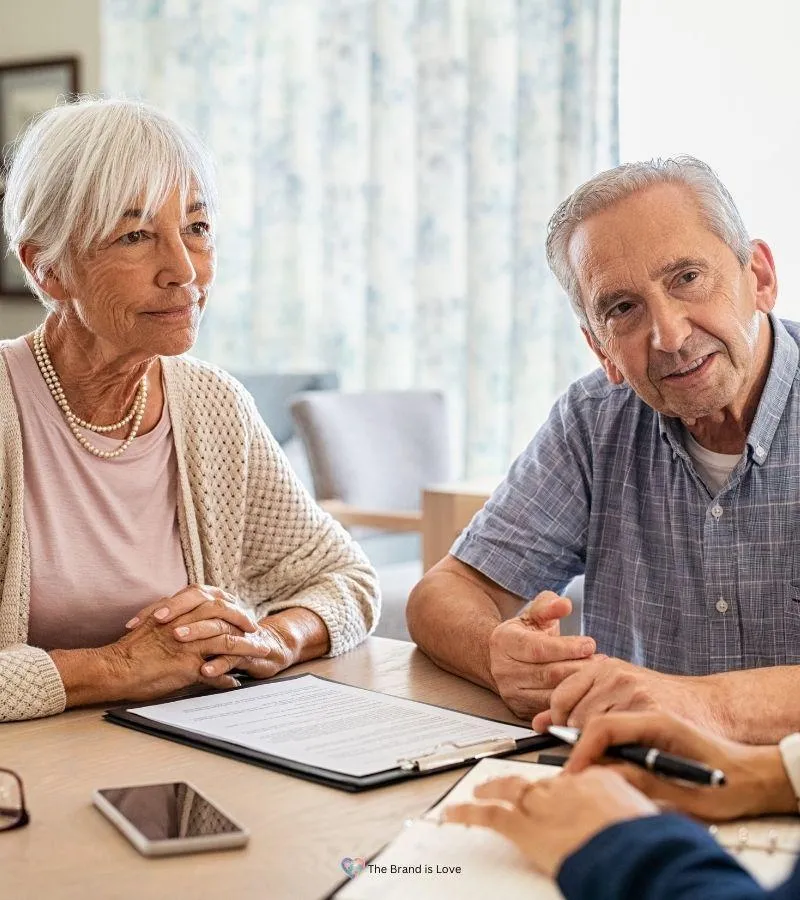 Elderly couple learning about elder care financial planning to secure their future.