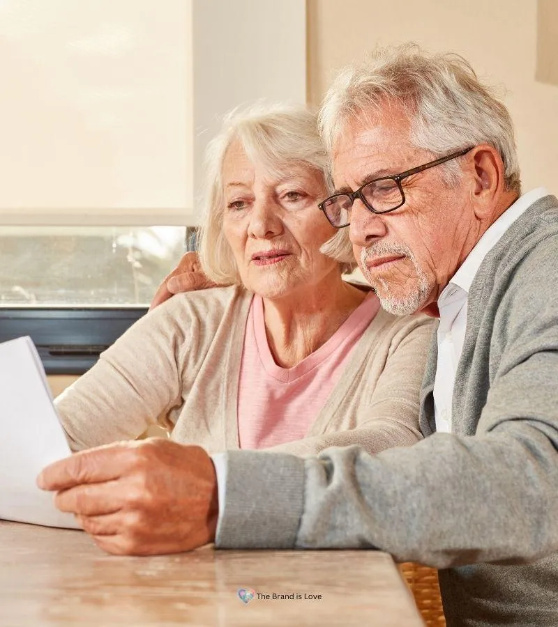 Elder couple reviewing their personalized financial plan received from trusted financial advisors for seniors.