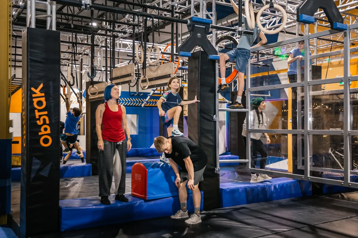woman payng withring in ninja warrior