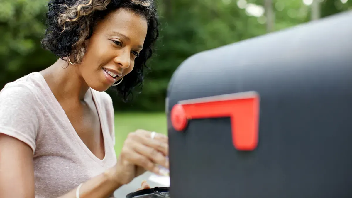 lady in boise happy with new mailbox