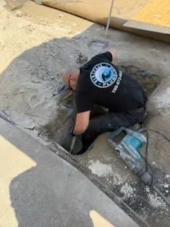 a pipe sticking out of the side of a building