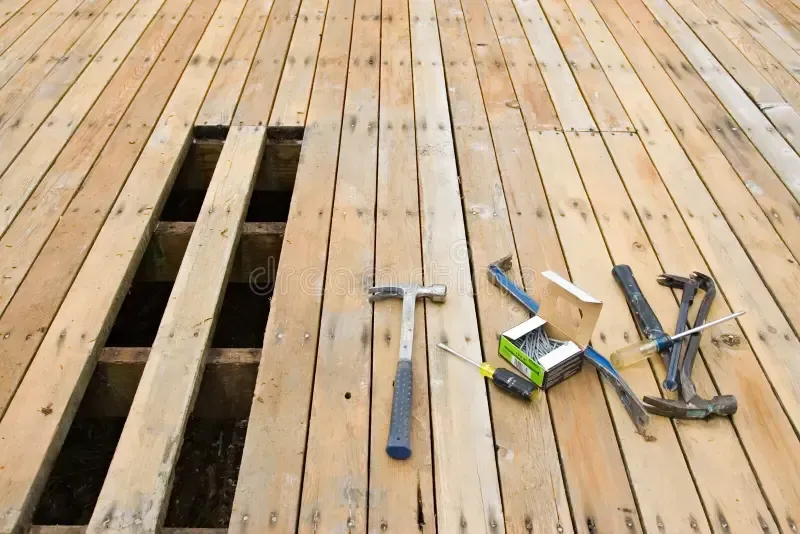 An older deck gets remodeled and repaired to make it look like new again