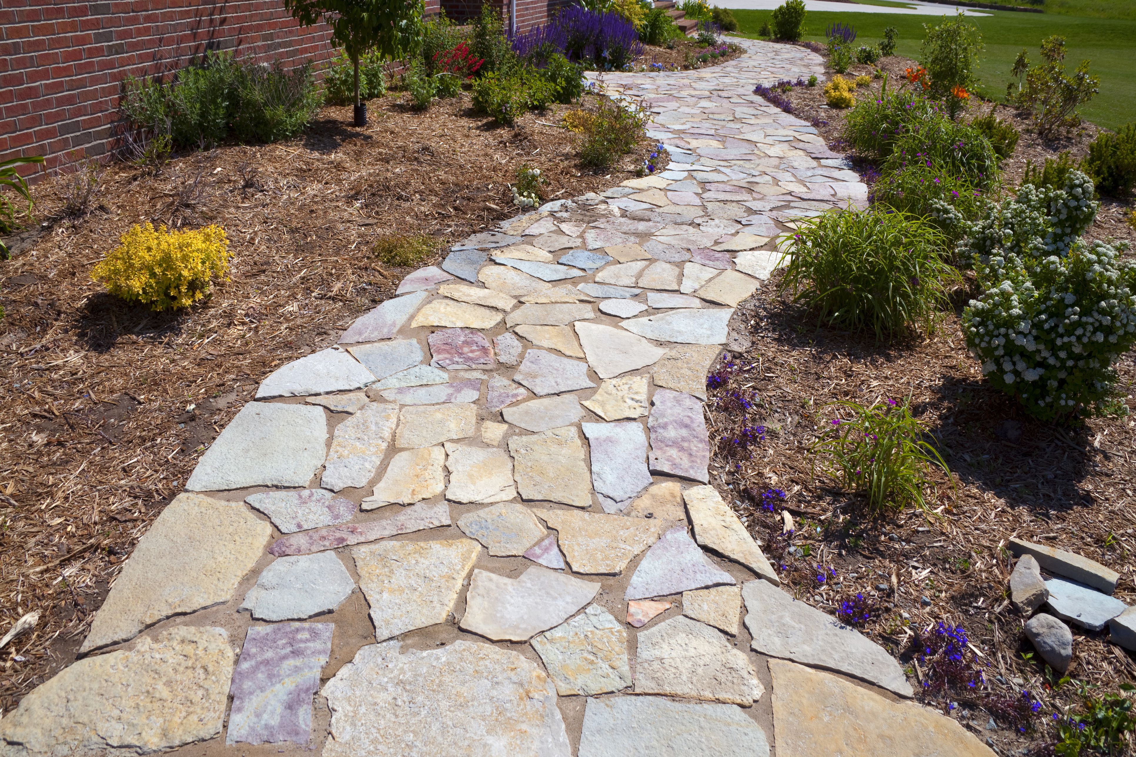 Natural stone patio installation in Southborough MA