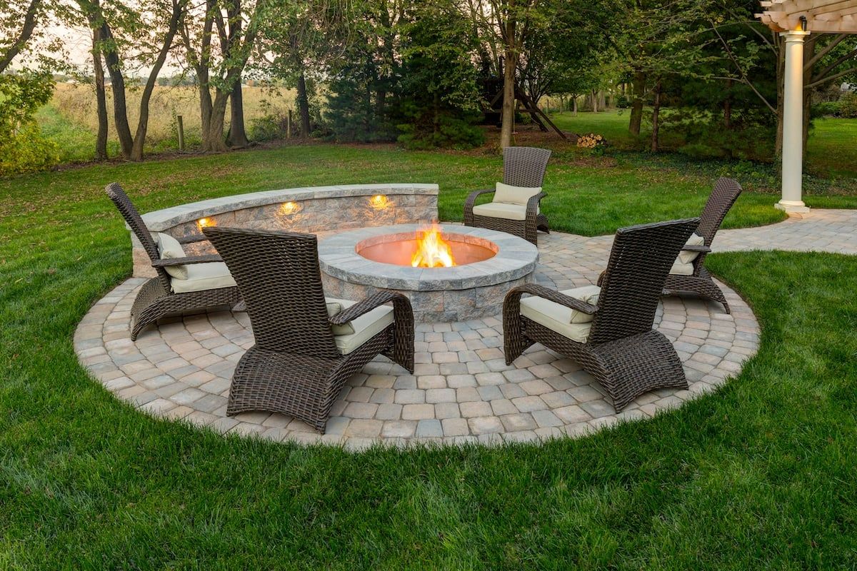 A firepit with seating in Lunenburg, MA