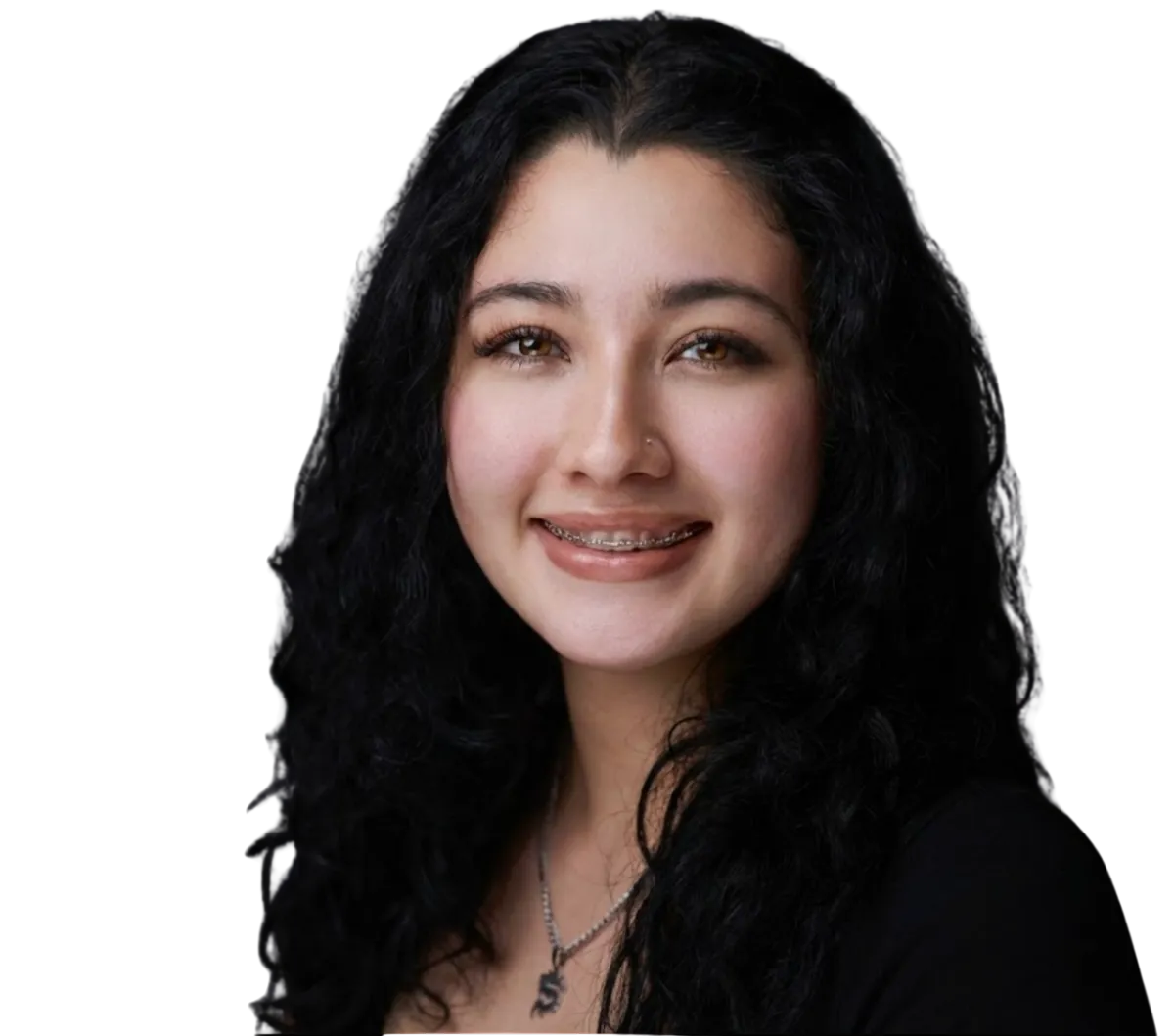 Confident Black female entrepreneur in soft natural tones, studio portrait.