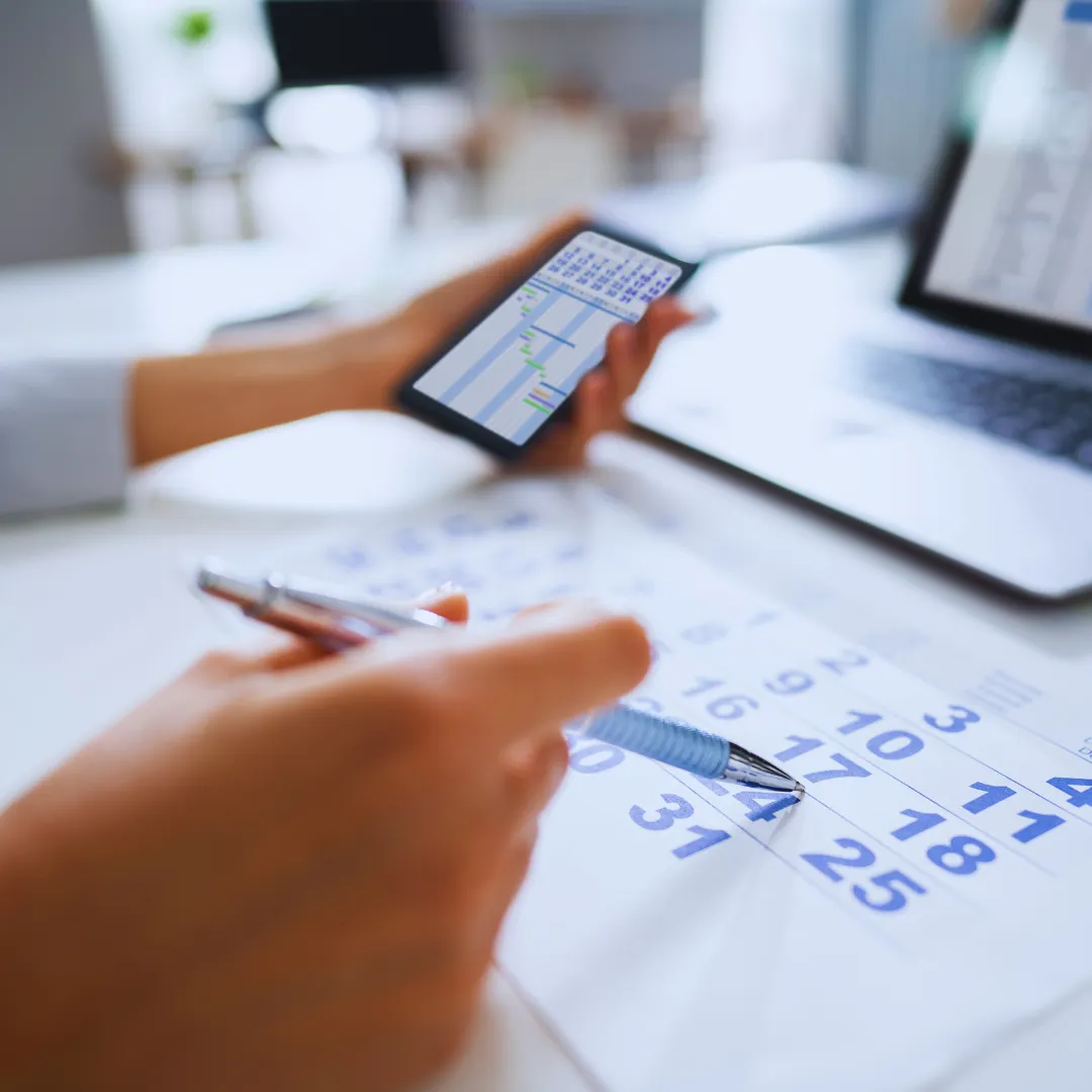 Phone with a calendar notification for a scheduled call, indicating planning and follow-up.