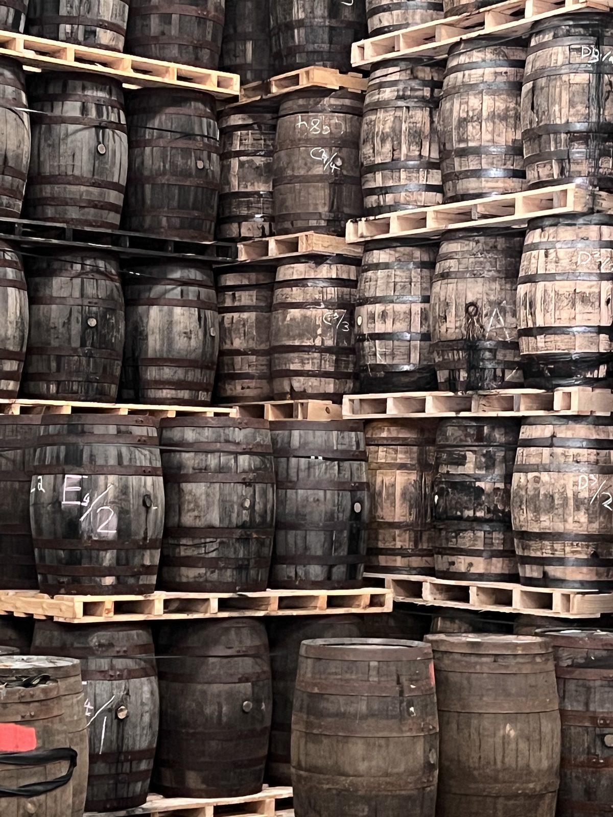 Casks maturing in a Speyside warehouse — the distilleries, and their decisions, are the story