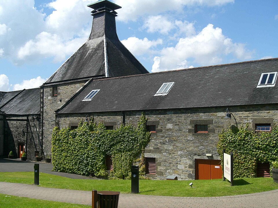 A kiln pagoda and bonded warehouse. Behind walls like these, casks work through every Scottish season while the people who own them go about their lives on the other side of the world.