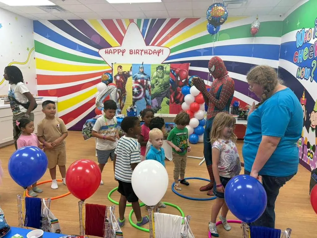 Kids playing in indoor playground during party