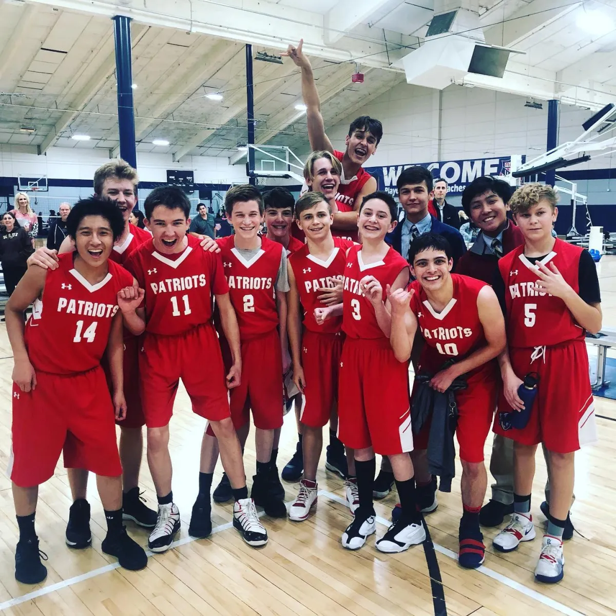 man holding incandescent bulb