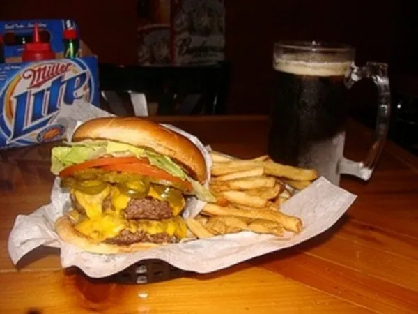Enjoy the best burger while watching your favorite team at Christians Tailgate