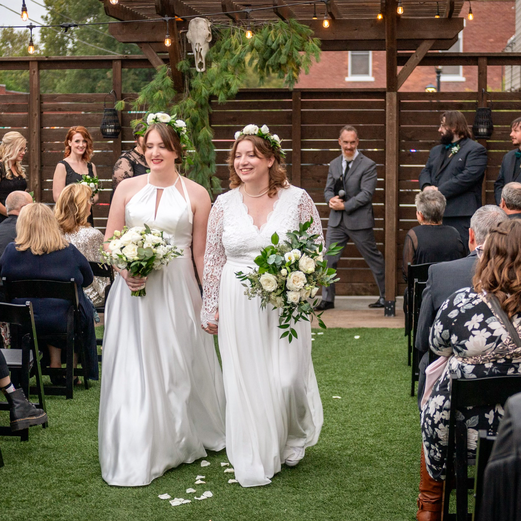 Same Sex couple smiling after their wedding ceremony is complete.